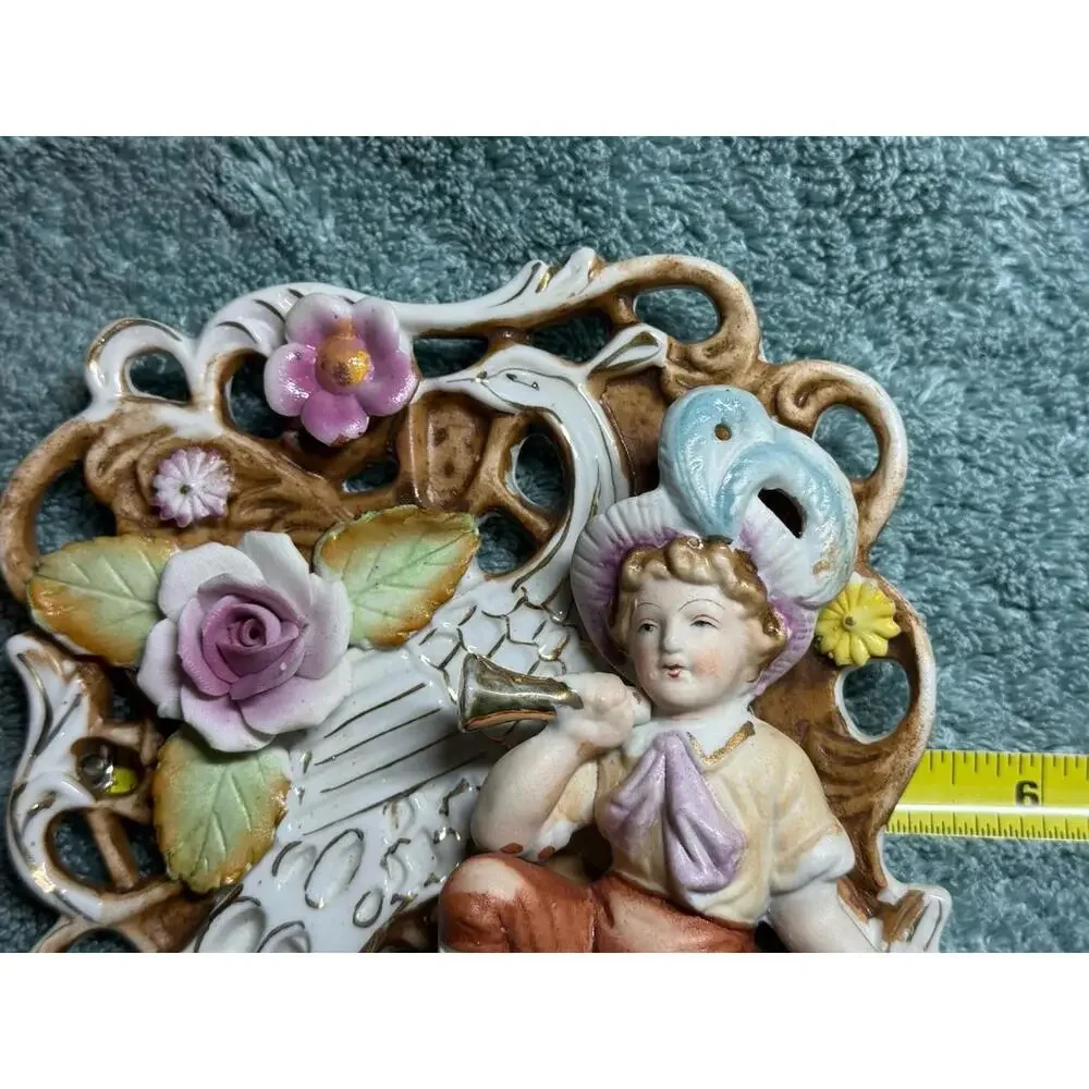 Vintage Porcelain Wall Plaque With Cherub And Floral Design